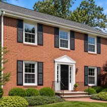 Replacement windows in Arlington VA installed on a classic brick colonial home